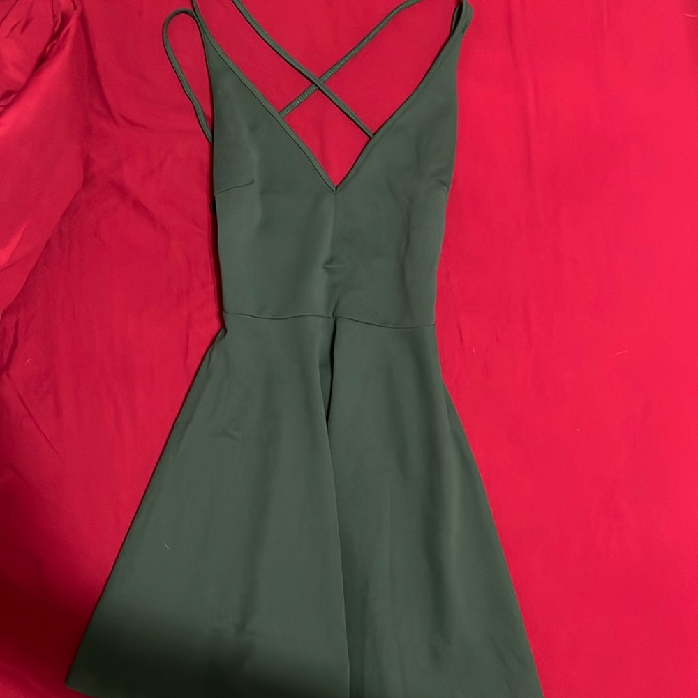Green open back dress
